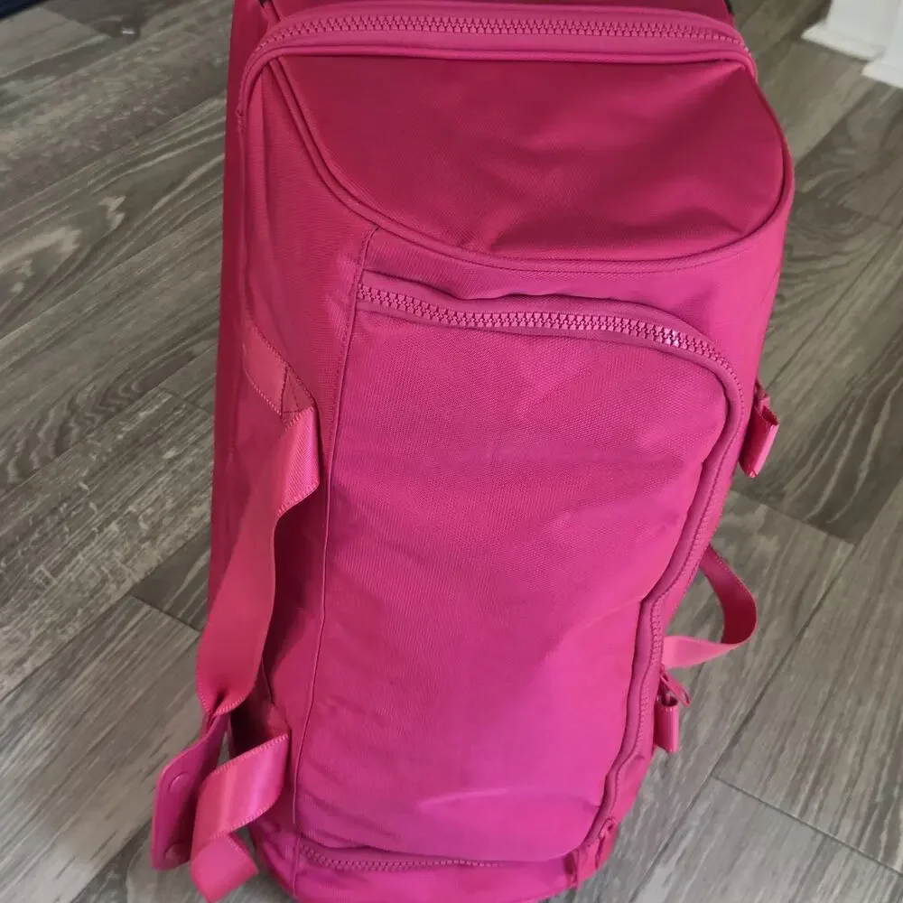 Calpak Stevyn Rolling Duffel Dragonfruit Pink Luggage Travel Wheeled